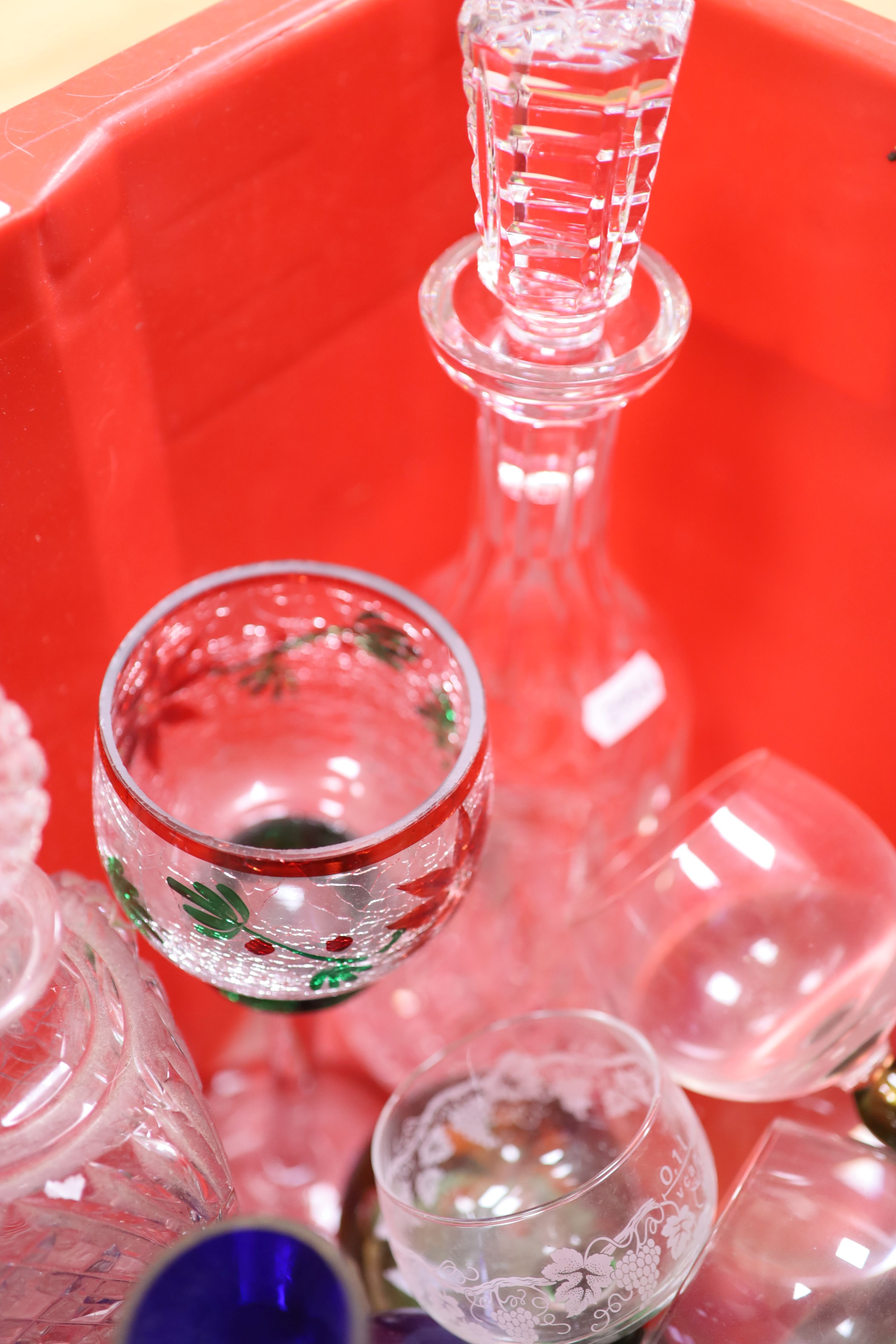 A collection of mixed glassware and glass paperweights